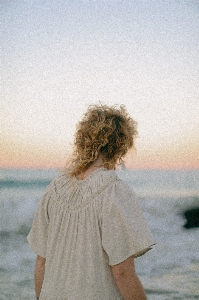 Woman sky water azure Photo