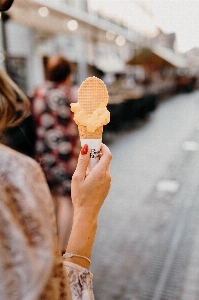 Woman food ice cream cone orange Photo