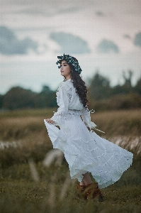 Woman face sky cloud Photo