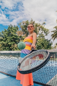 Woman cloud sky playing sports Photo