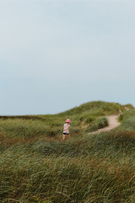 Sky people in nature slope grass