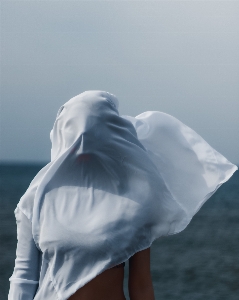 Woman water sky cloud Photo