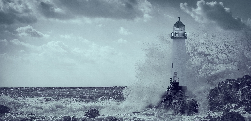 Lighthouse sea storm cloud