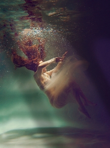 Woman water underwater flash photography Photo