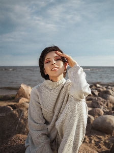 Woman water sky cloud Photo