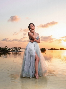 Woman hair cloud water Photo