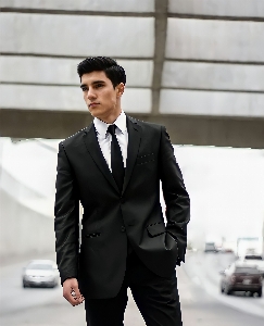 Cute boy beautiful man mexican black suit Photo