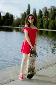 Woman footwear glasses water Photo