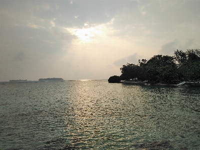 Foto Atardecer nube agua cielo