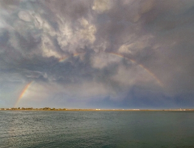 Rainbow cloud water sky Photo