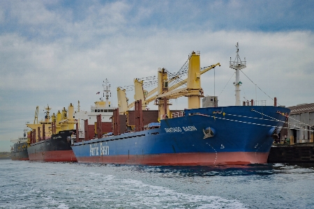 Cargoship water sky clouds Photo