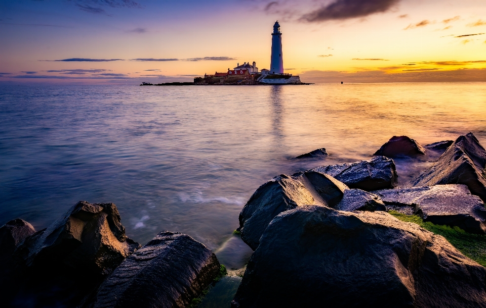 Sun water cloud lighthouse