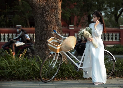 Woman bicycle wheel plant Photo