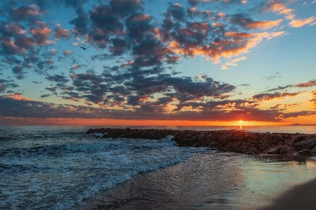 Sunset water cloud sky Photo