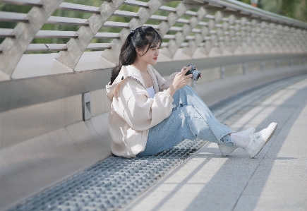 Woman glasses shoe leg Photo