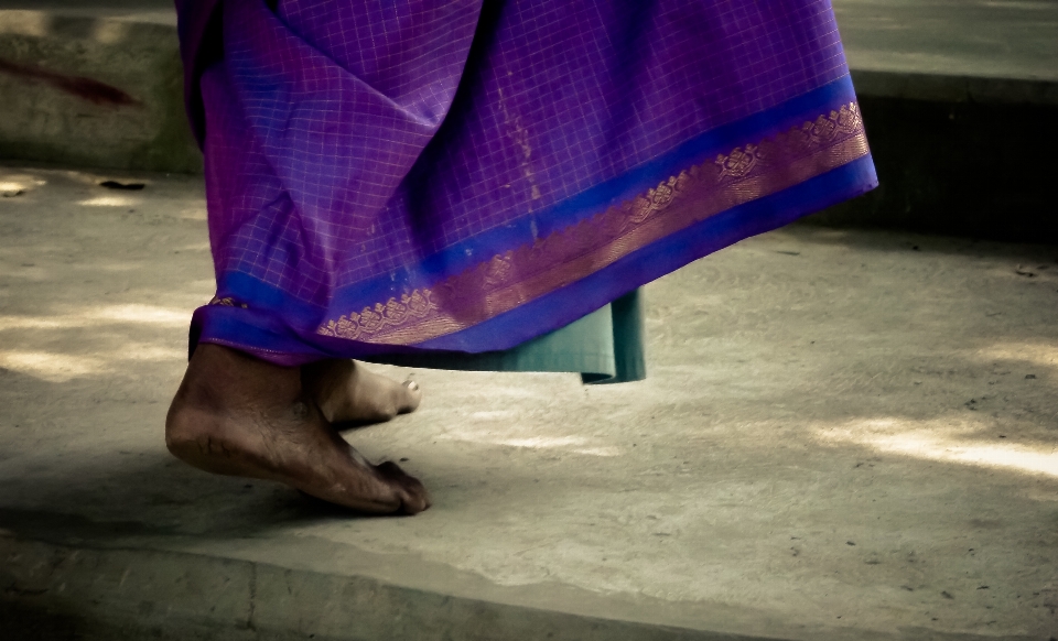 Woman feet color blue