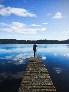 Man sea coast water Photo