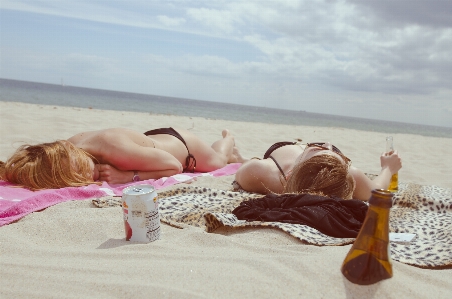 Hand beach sand ocean Photo