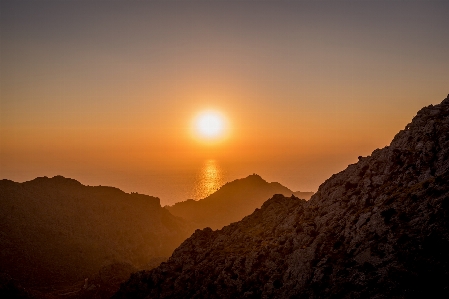 海洋 地平線 山 太陽 写真