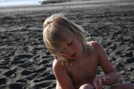 Hand beach sea sand Photo