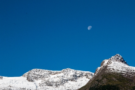 Rock mountain snow sky Photo