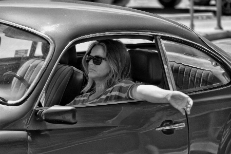 Person black and white woman car Photo