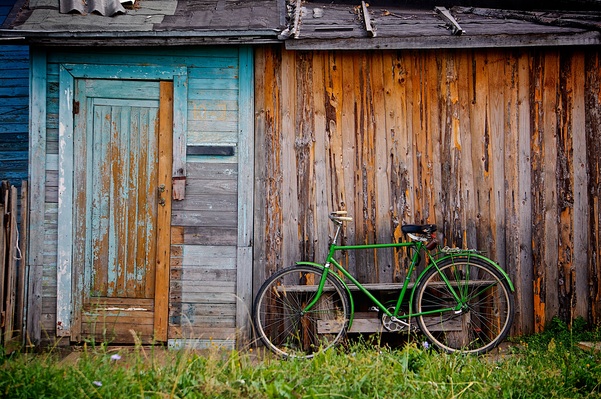 Wood house window bicycle Photo