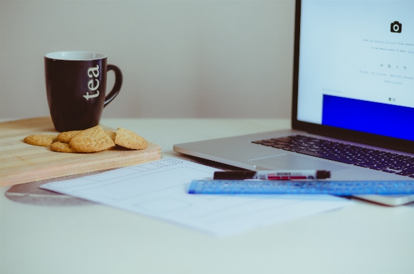 Laptop desk writing tea Photo